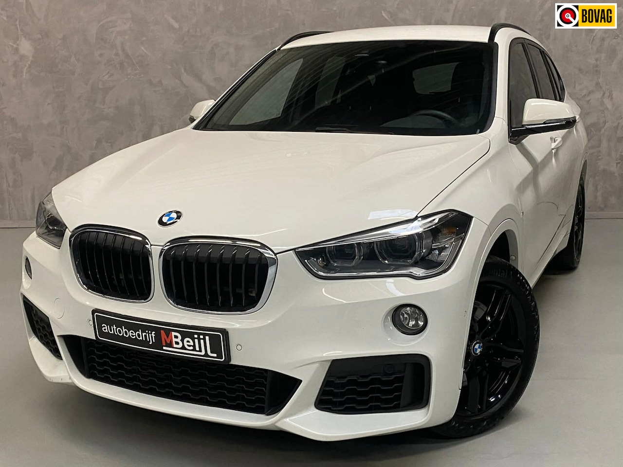 BMW X1 - SDrive20i High Executive /M-Pakket /Trekhaak /Navi - AutoWereld.nl