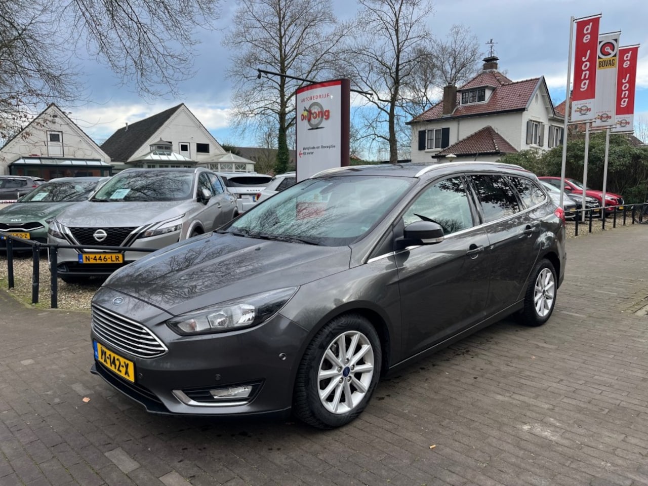 Ford Focus Wagon - WAGON 1.5 TDCI TITANIUM AUTOMAAT / NAVI / STOEL+STUUR VERWARMING / AFN. TREKHAAK - AutoWereld.nl