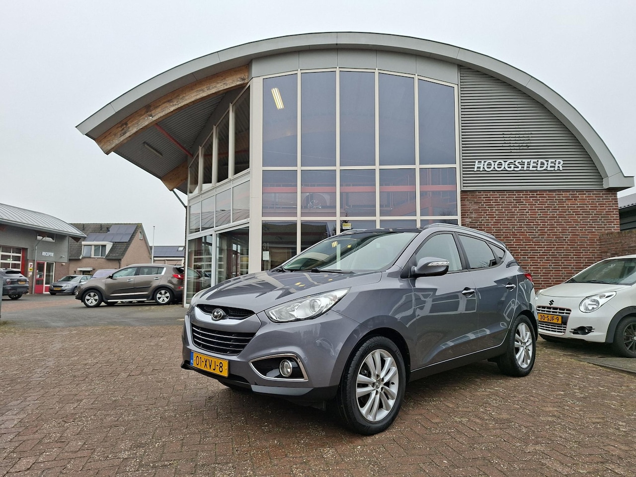 Hyundai ix35 - 2.0i i-Catcher 2.0i i-Catcher, schuifdak, leer, trekhaak - AutoWereld.nl