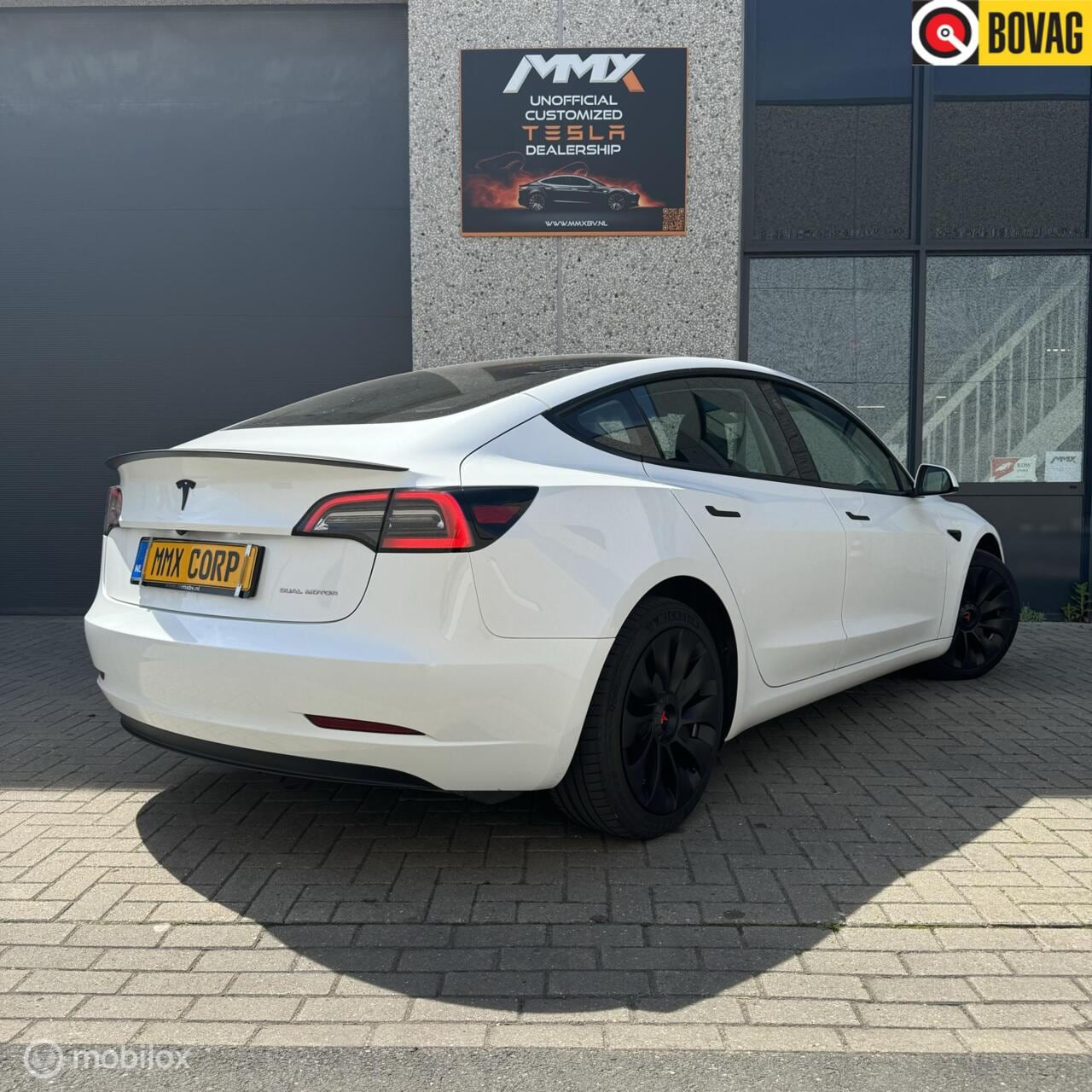 Tesla Model 3 - Long Range RWD Long Range AWD + MMX PACK + TREKHAAK - AutoWereld.nl