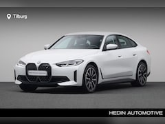 BMW i4 - eDrive40 84 kWh | Achteruitrijcamera | Cruise control | Elektrisch verwarmde voorstoelen |