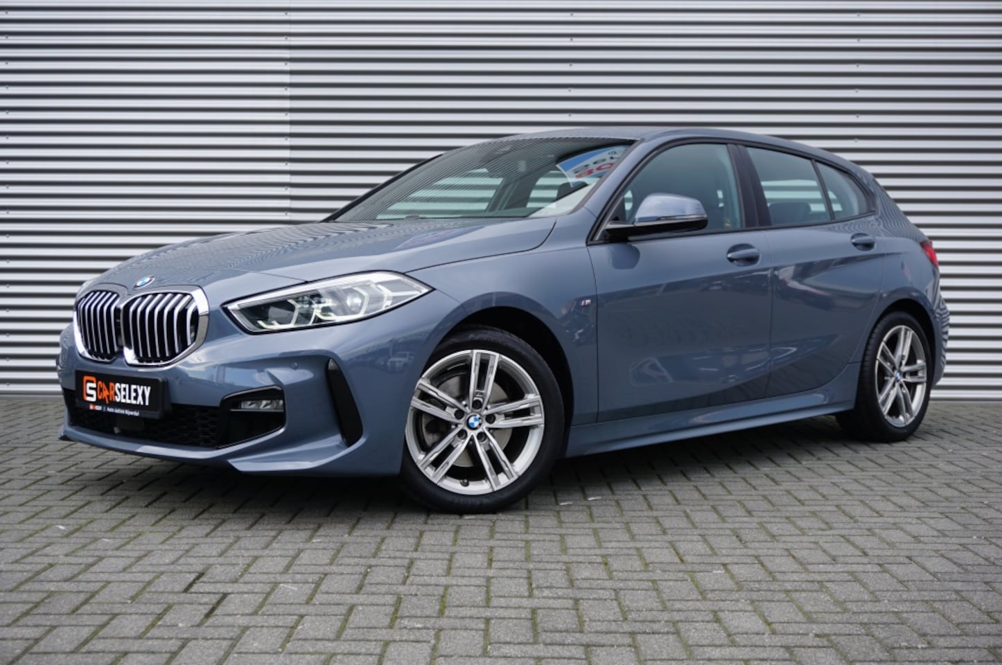 BMW 1-serie - 118i High Executive AUTOMAAT | SPORT LINE | 140PK | LEDER - AutoWereld.nl