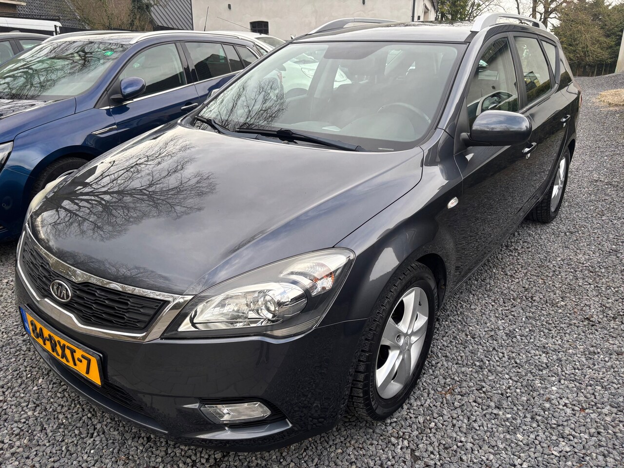 Kia Cee'd Sporty Wagon - 1.4 CVVT Seven KM 139000 MET NAP - AutoWereld.nl