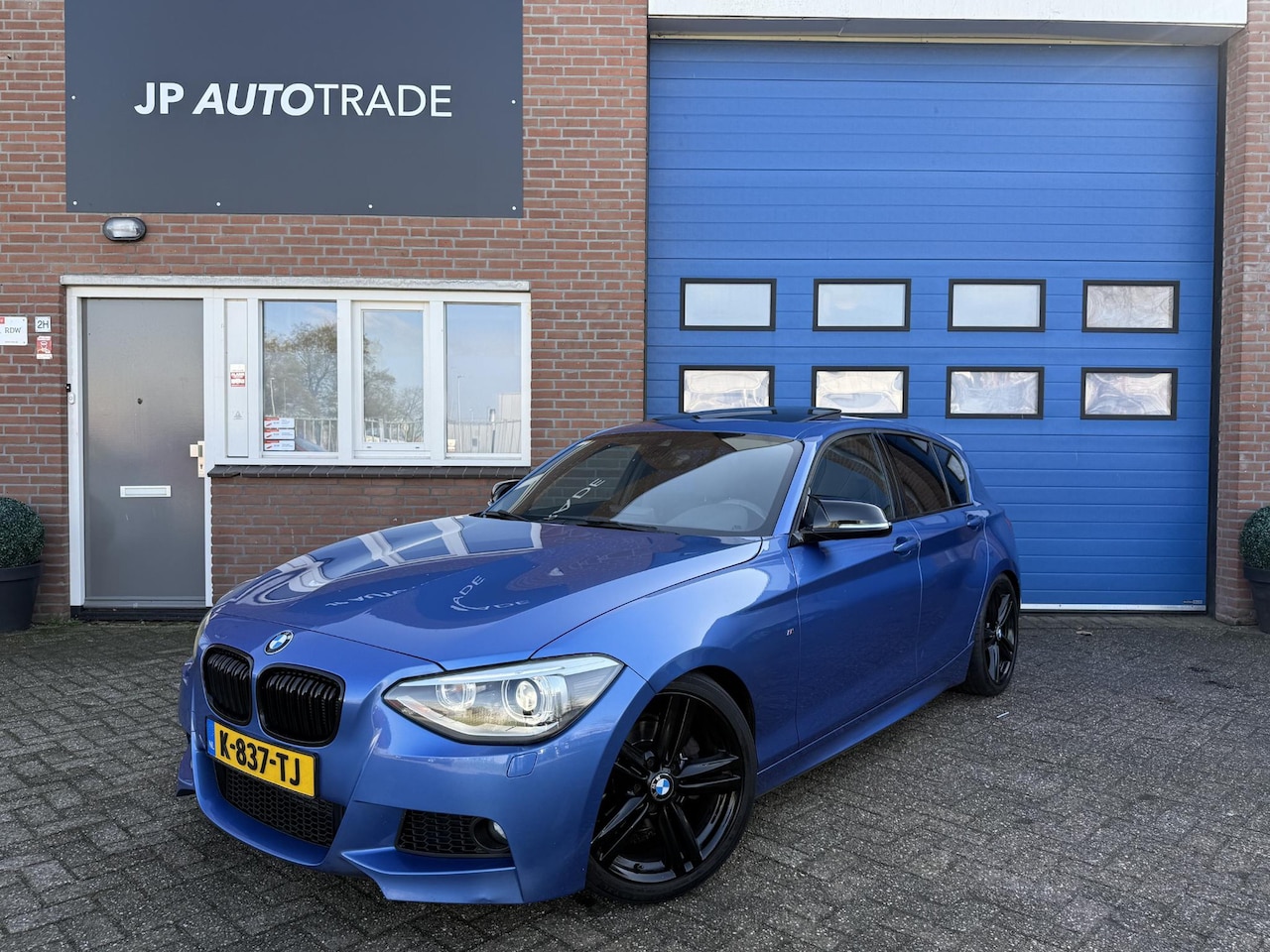 BMW 1-serie - 118i | Led | M-pakket | Pano | Aut. | NW Ketting - AutoWereld.nl