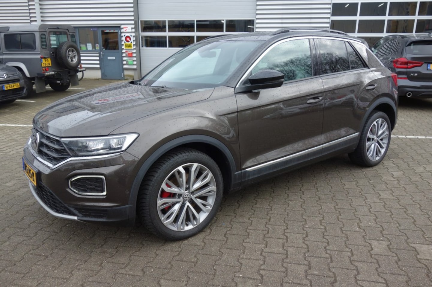 Volkswagen T-Roc - 1.5 TSI Sport 1.5 TSI SPORT, Pano, 18 Inch, Beats, Winterpakket - AutoWereld.nl