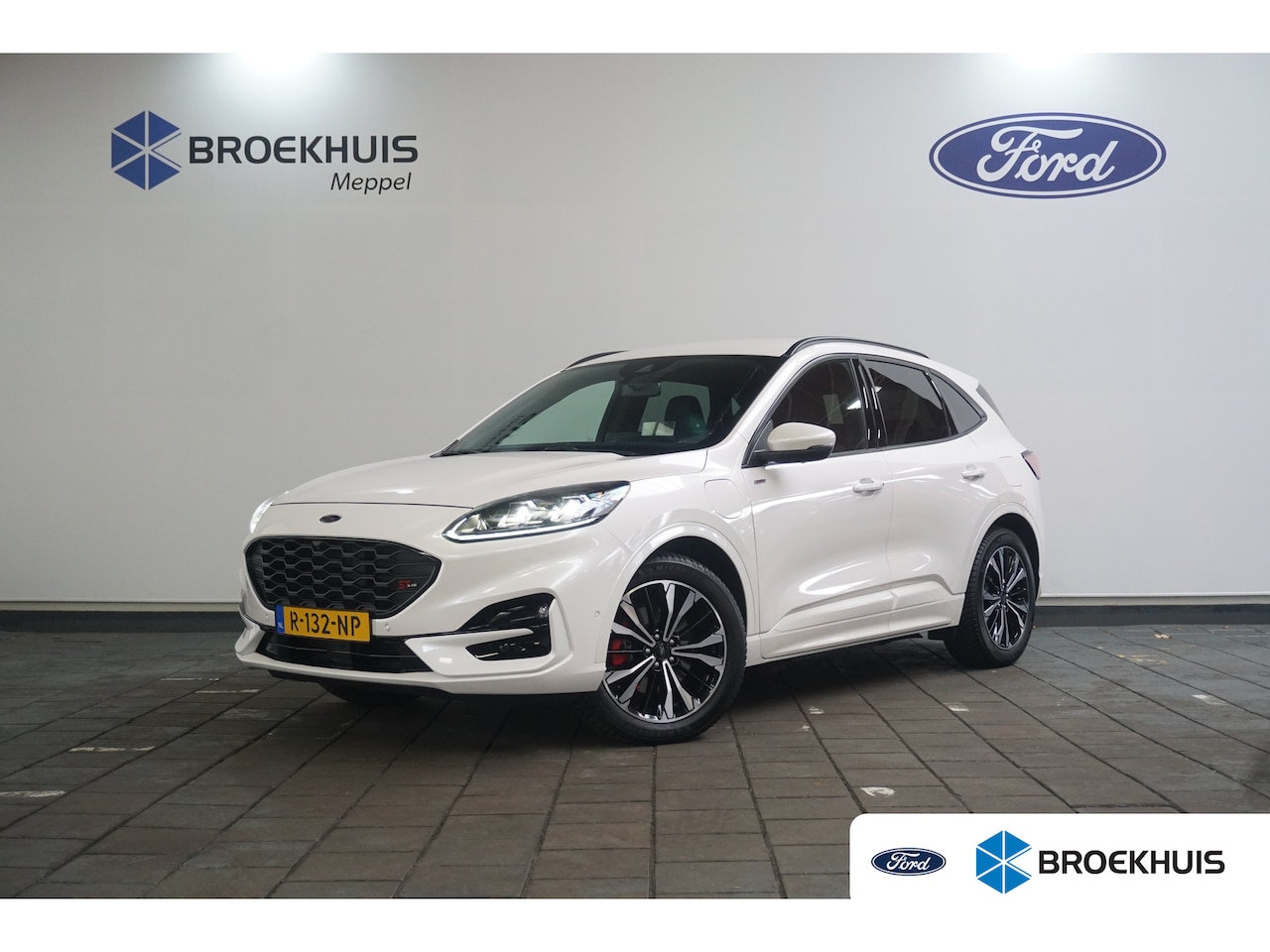 Ford Kuga - 2.5 PHEV ST-Line X | Cruise control adaptief | Head-up display | Navigatiesysteem full map - AutoWereld.nl