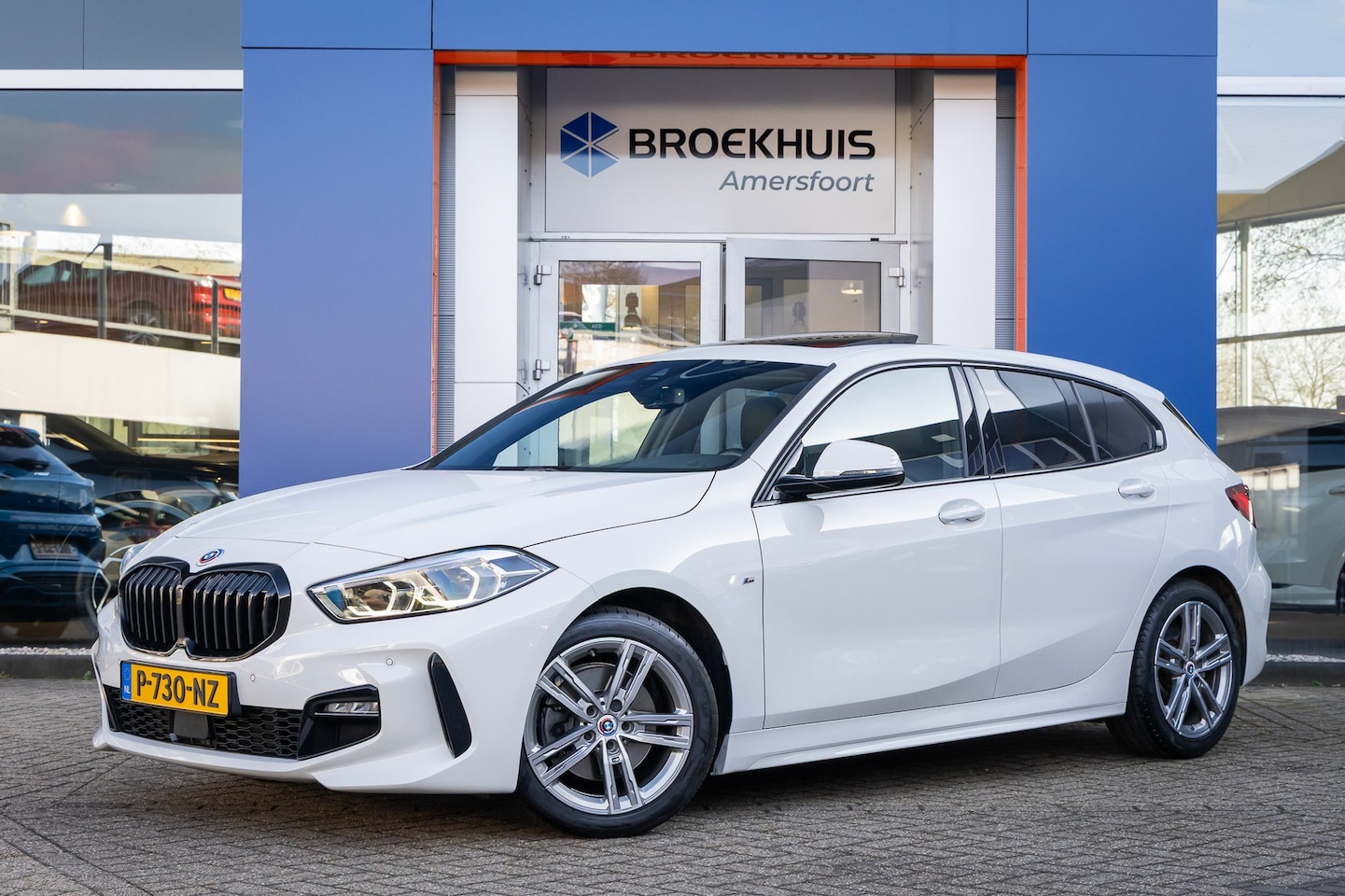 BMW 1-serie - 118i Business Edition | M pakket | Pano | Apple Carplay/Android Auto | Stoel verwarming | - AutoWereld.nl