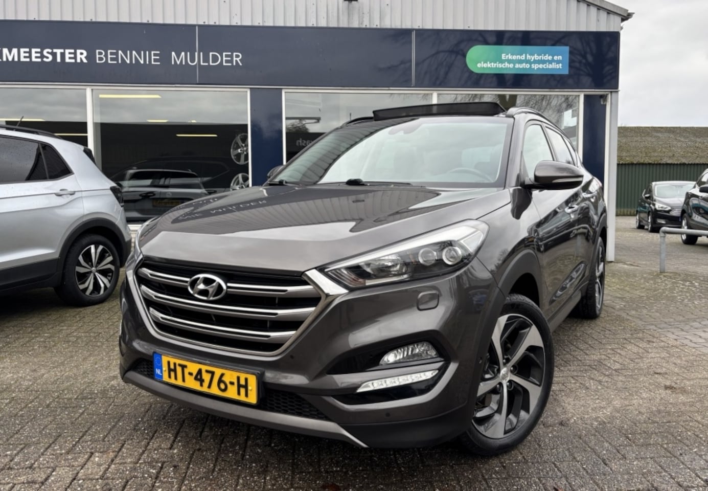 Hyundai Tucson - 1.6 T-GDi Premium 4WD / AUT. / SCHUIFDAK / LEDER - AutoWereld.nl