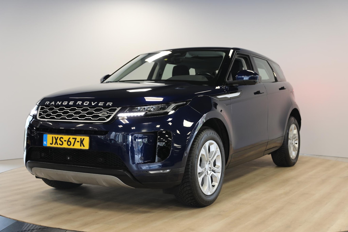 Land Rover Range Rover Evoque - 1.5 P300e AWD | Schuif- kanteldak | 360 Camera | Apple Carplay - AutoWereld.nl