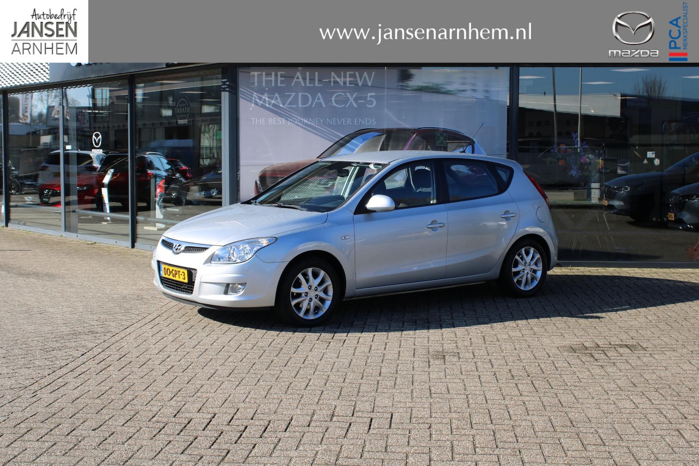 Hyundai i30 - 1.6i Style 1.6i Style , Automaat, 16 inch LM velgen, Airco, PDC, Deels leer, Elektrische ramen en spi - AutoWereld.nl