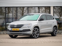 Skoda Karoq - 1.5 TSI ACT Sportline Business | Trekhaak | Adapt. Cruise | Camera | 19" | Winterpakket