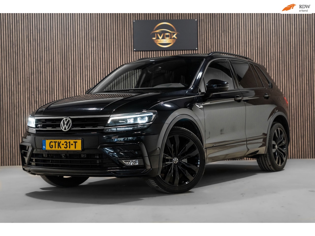 Volkswagen Tiguan - 2.0 TSI 4Motion Highline R-Line DSG PANO PDC LED - AutoWereld.nl