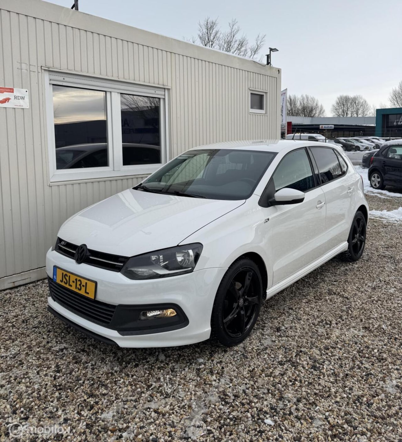 Volkswagen Polo - 1.2 R-Line Navigatie Airco New APK - AutoWereld.nl