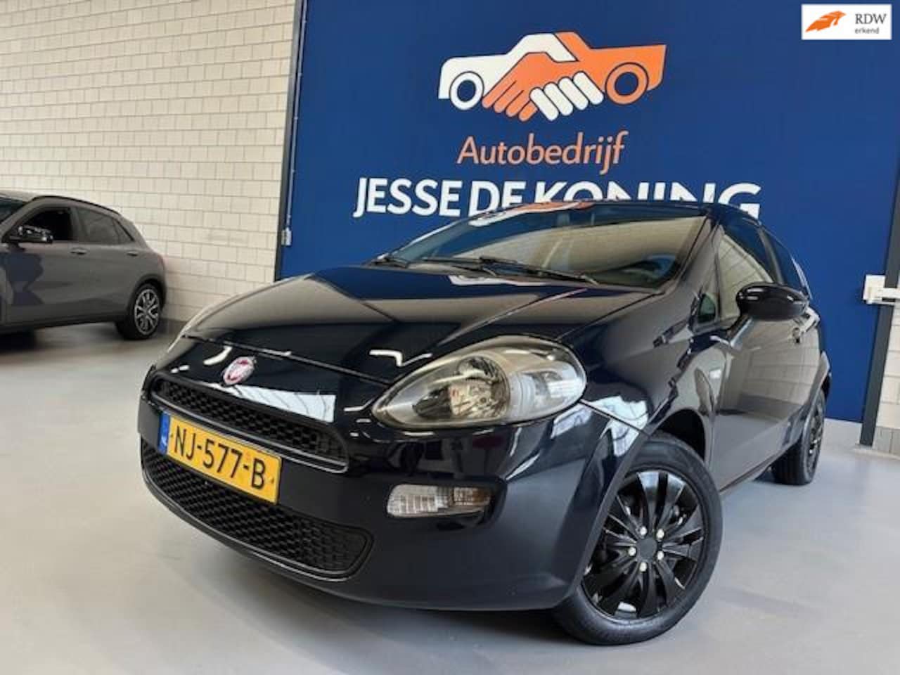 Fiat Punto Evo - 1.2 Pop /bj.2013 / kleur: blauw / airco / scherm / navigatie/ NAP met 152343 km.en APK tot - AutoWereld.nl