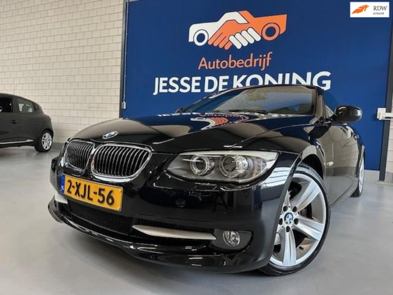 BMW 3-serie Cabrio - 335i High Executive Automaat/ bj.2011 / kleur: zwart/ zwart leder/navigatie/climate/NAP 15 - AutoWereld.nl