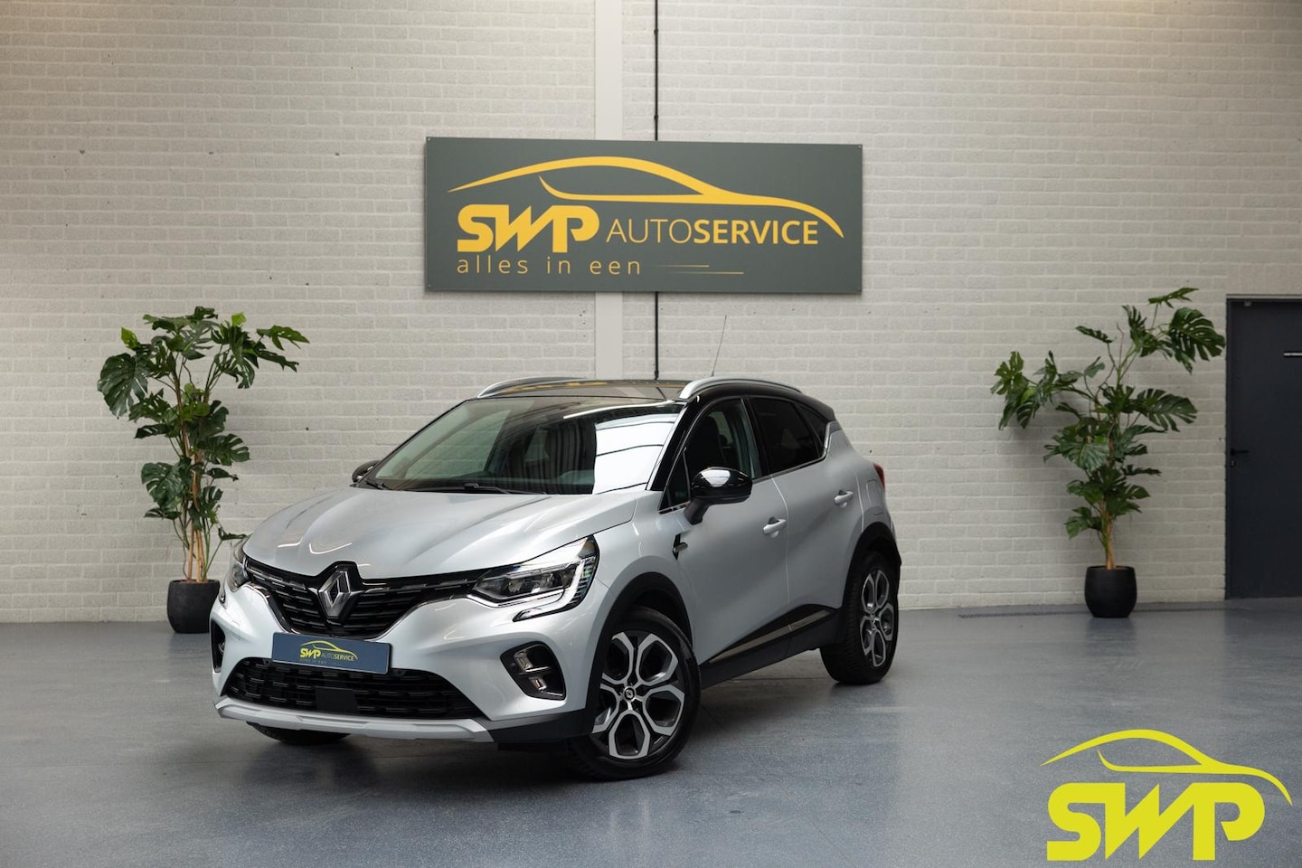 Renault Captur - 1.6 E-Tech Plug-in Hybrid 160 Intens | Navi | Camera | Stoelverwarming | Automaat | Plug-i - AutoWereld.nl