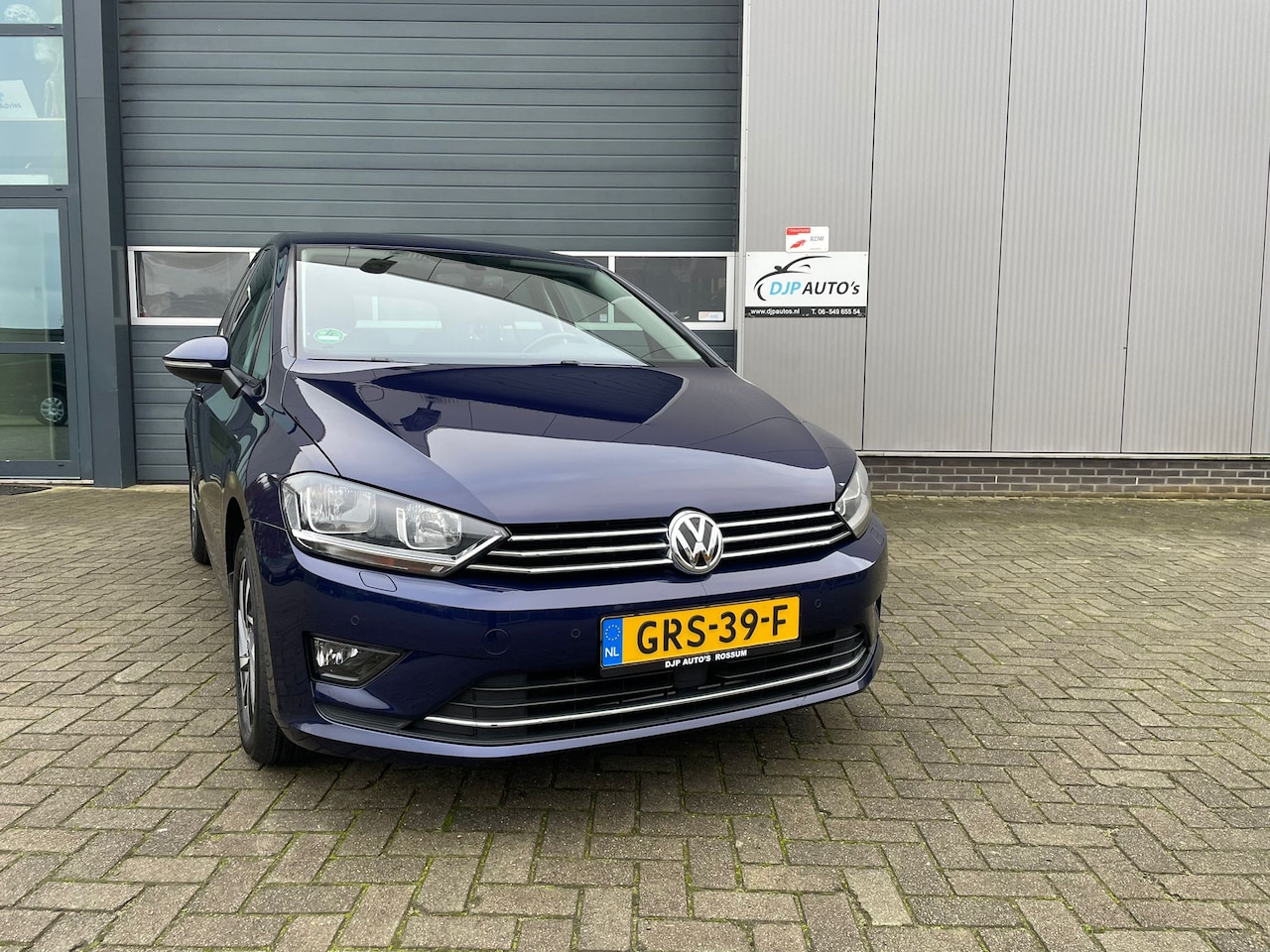 Volkswagen Golf Sportsvan - 1.2 TSI Highline Sound AUTOMAAT o.a. Airco / Clima / Cruise control / PDC / Parkpilot / Trekhaak Etc! - AutoWereld.nl