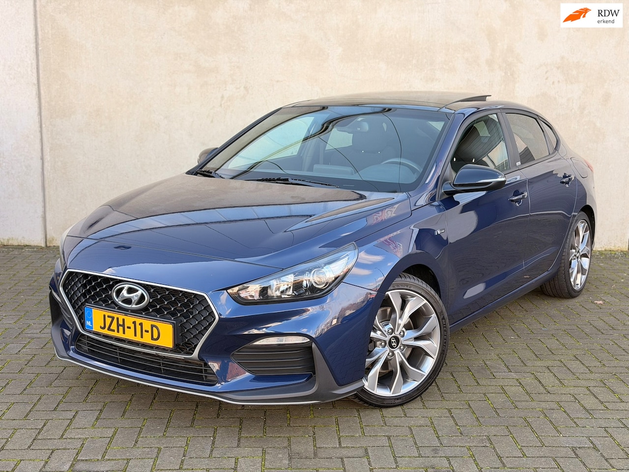Hyundai i30 Fastback - 1.4 T-GDI N-Line Pano 18'' CarPlay Keyless - AutoWereld.nl