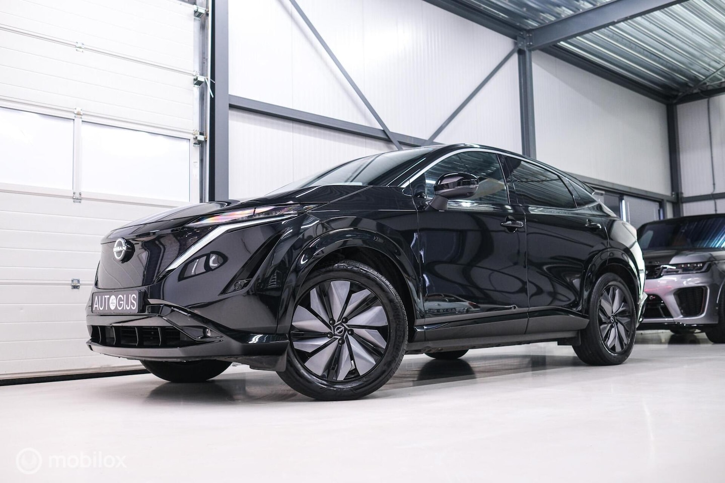 Nissan Ariya - Advance 66 kWh | 360 camera | navigatie | Halfleder | NAP NL auto | Rijklaarprijs | stoelv - AutoWereld.nl