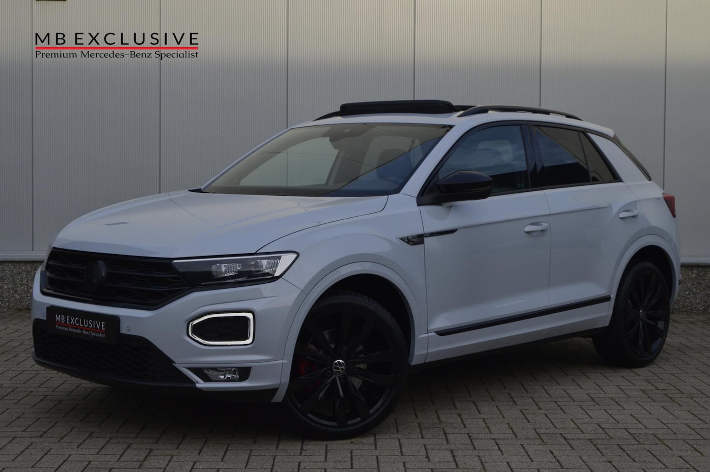 Volkswagen T-Roc - 2.0 TSI 4Motion Sport Black Style DSG 190pk - AutoWereld.nl