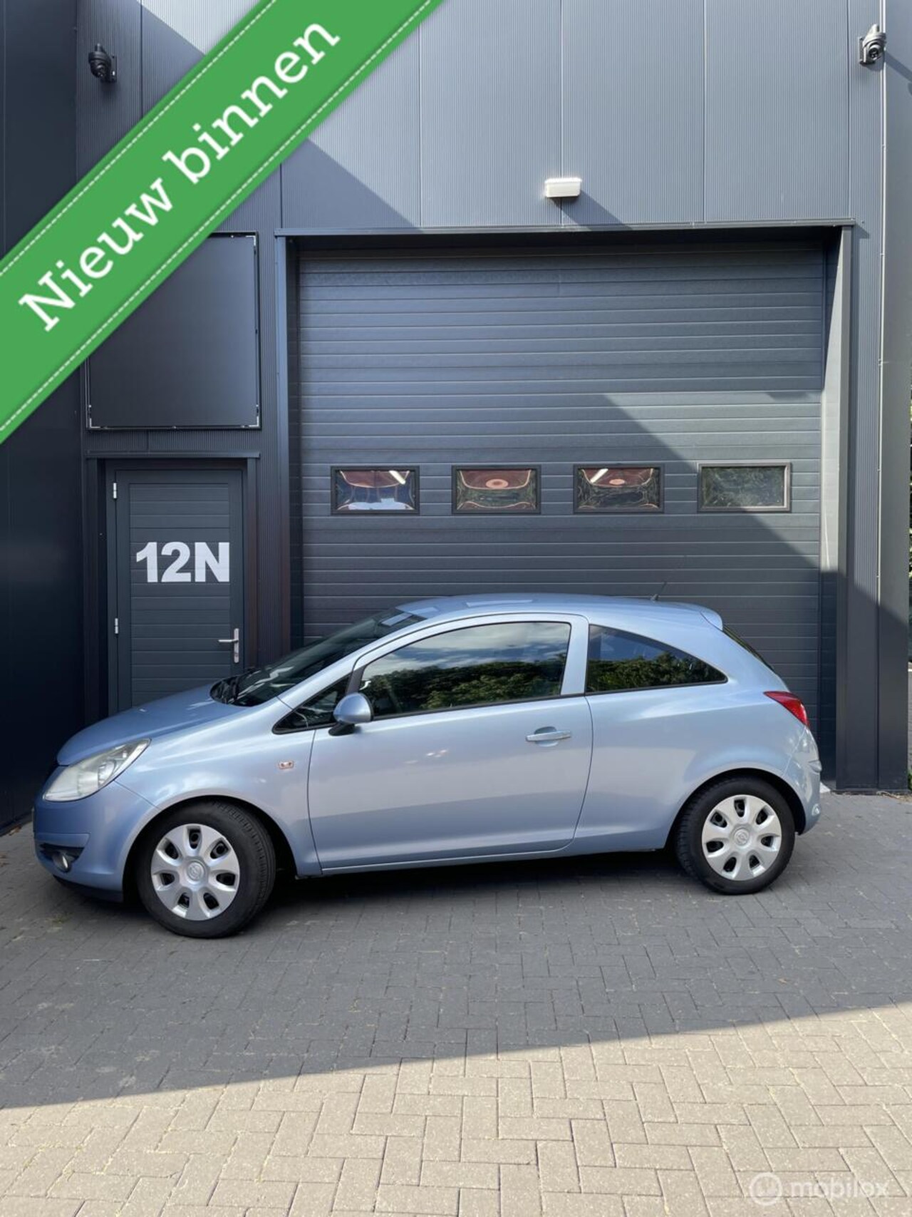 Opel Corsa - 1.2-16V Enjoy. AIRCO - TREKHAAK - APK EIND 2026 - AutoWereld.nl