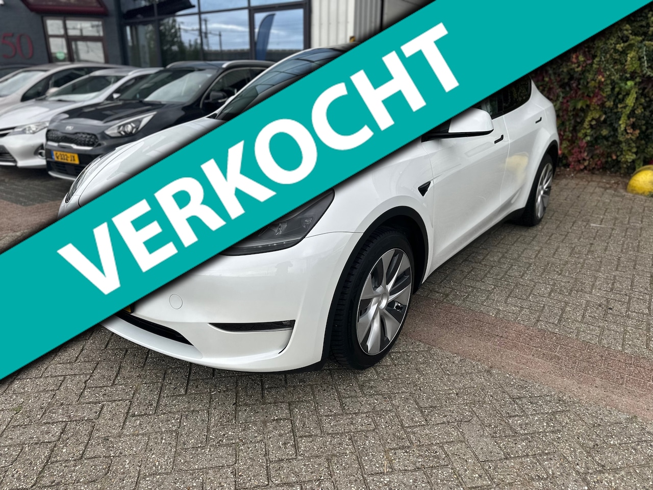 Tesla Model Y - Long Range AWD 75 kWh Long Range AWD 75 kWh ,1.Hand,Trekhaak,Ex.btw - AutoWereld.nl