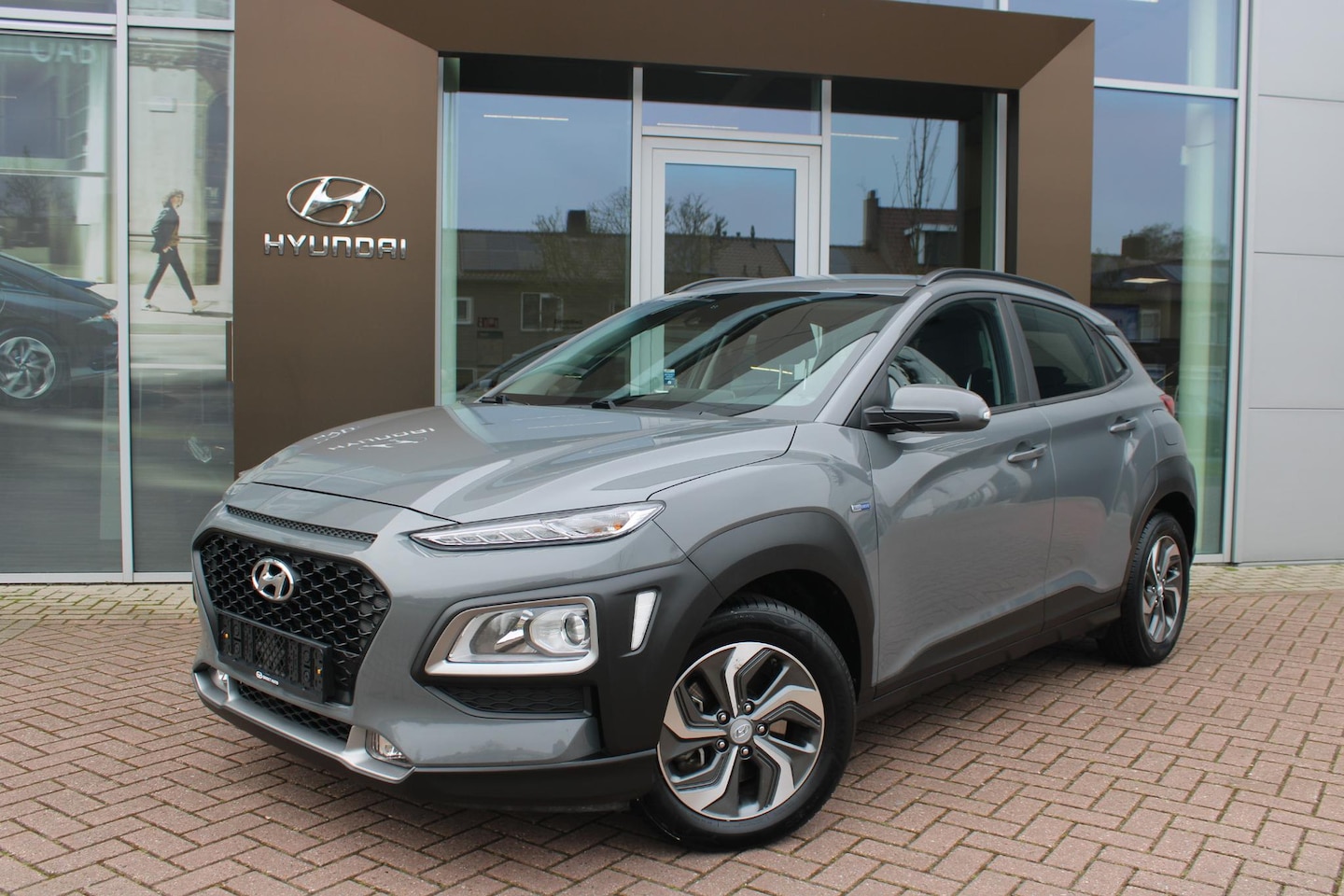 Hyundai Kona - 1.6 GDI HEV 140pk Comfort Smart Automaat Hybrid Airco Navi Camera Carplay - AutoWereld.nl