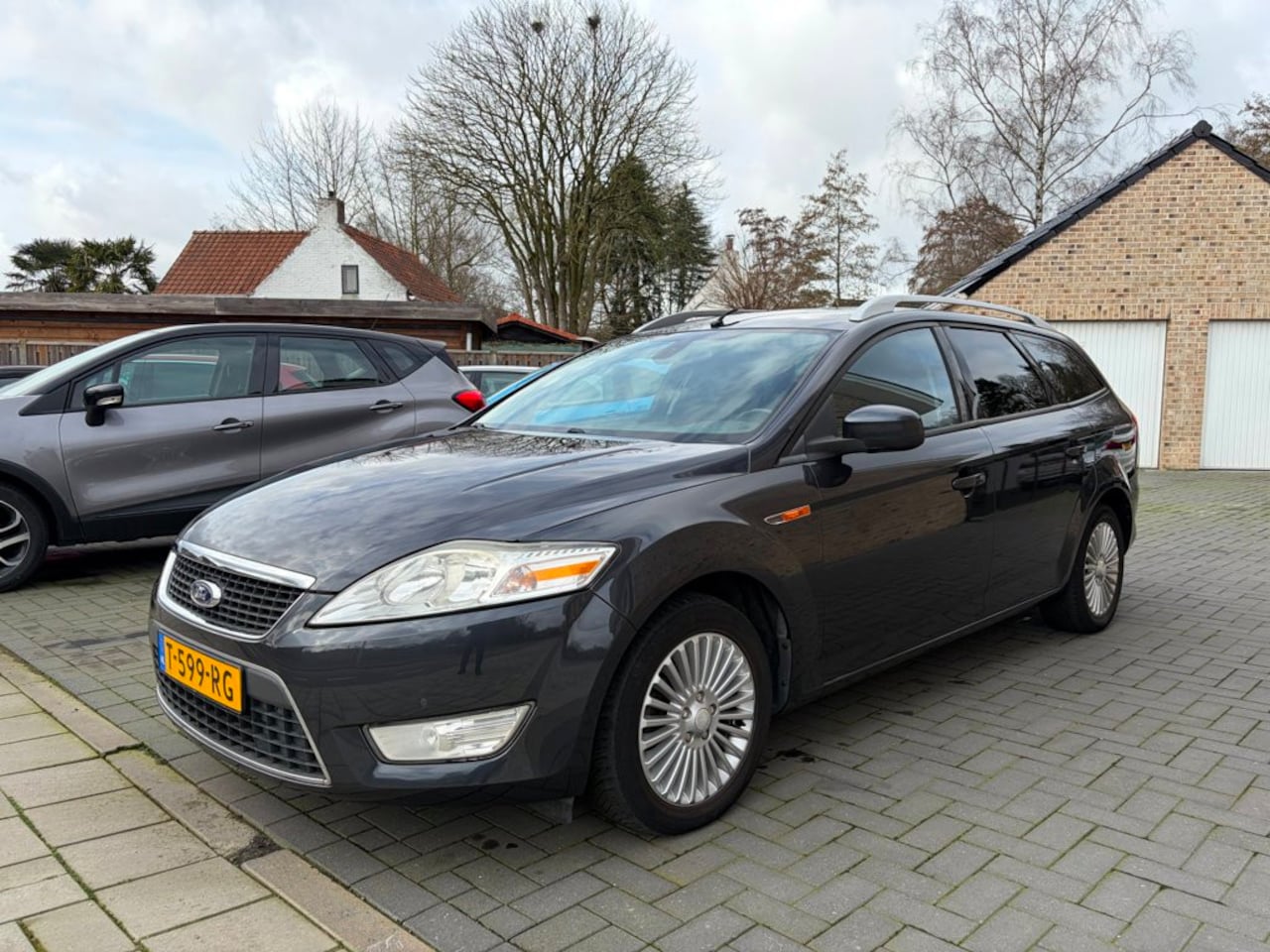 Ford Mondeo Wagon - 1.6-16V Trend Airco Navigatie 122Dkm PDC LMV - AutoWereld.nl