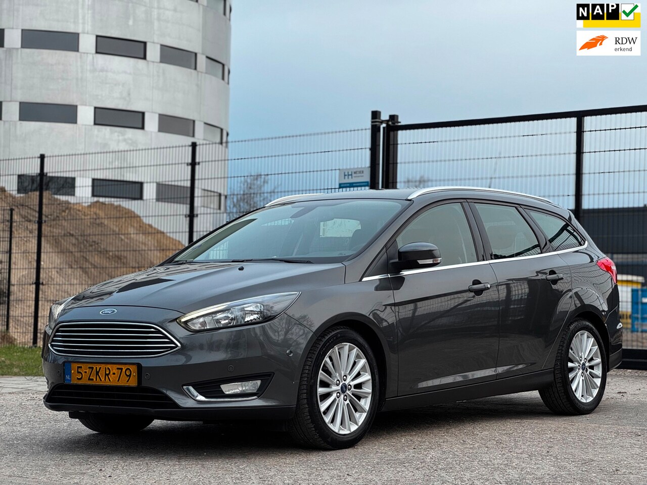 Ford Focus Wagon - 1.0 First Edition|NAVI|LED|PSENSOR|TREKHAAK|CRUISE|AIRCO| - AutoWereld.nl