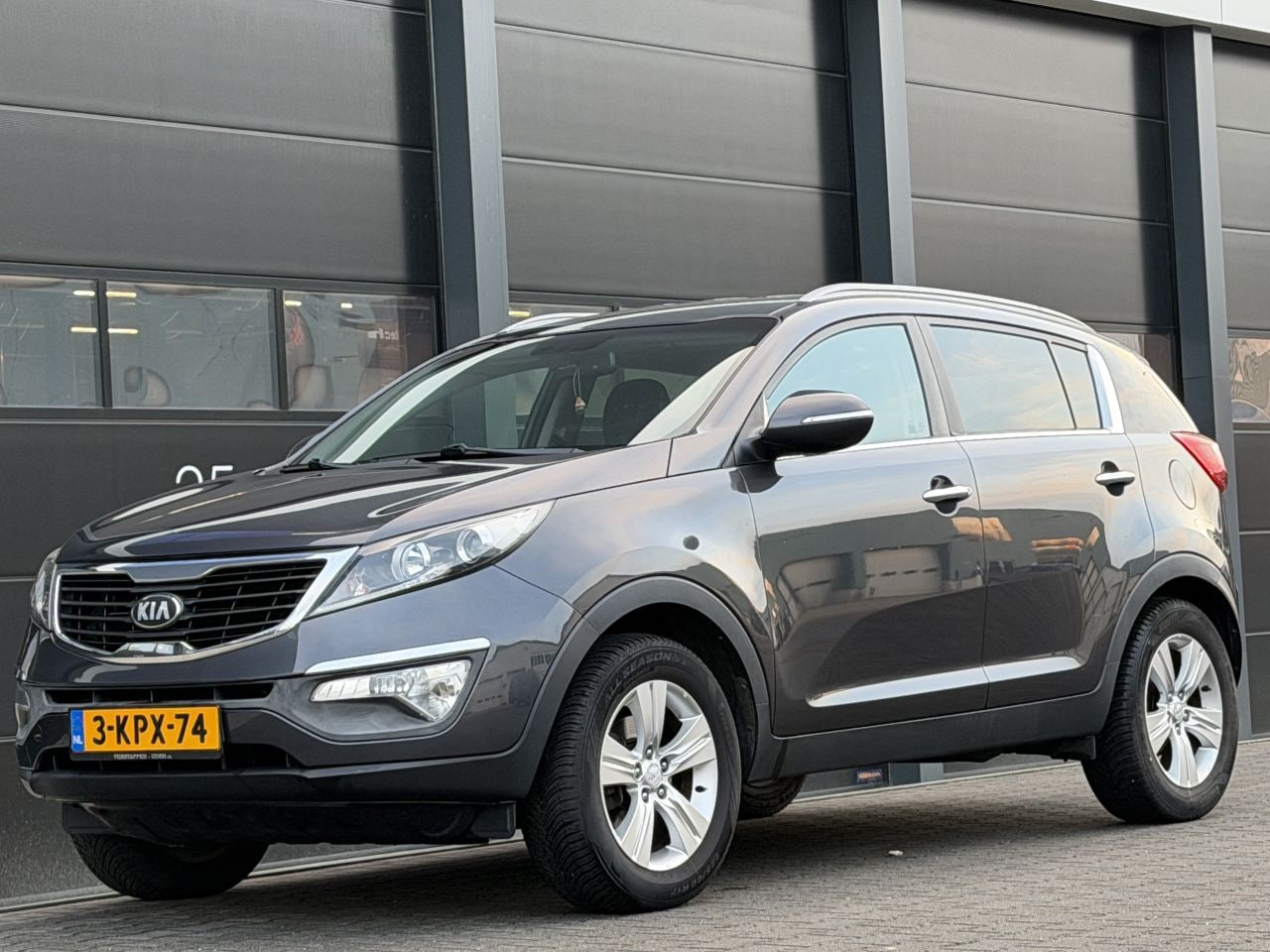 Kia Sportage - 1.6 GDI Navi Clima Leer - AutoWereld.nl