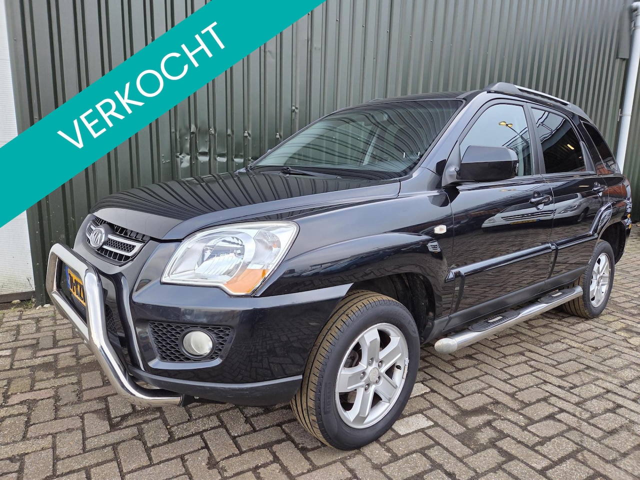 Kia Sportage - 2.0 CVVT X-tra 2.0 CVVT X-tra - AutoWereld.nl