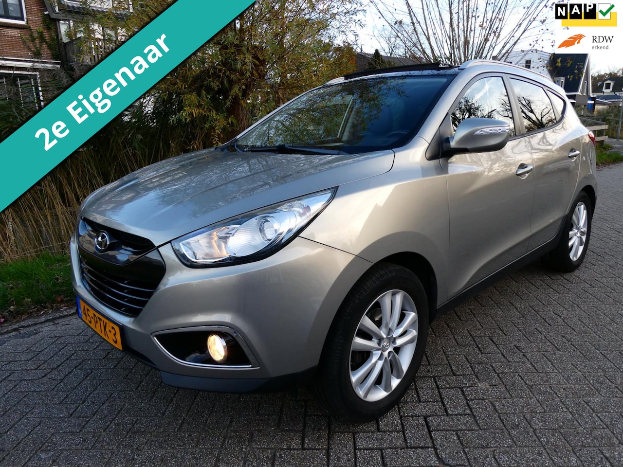Hyundai ix35 - 2.0i i-Catcher 163pk 2e eig. Clima Navi Leder Trekhaak 1900kg. - AutoWereld.nl