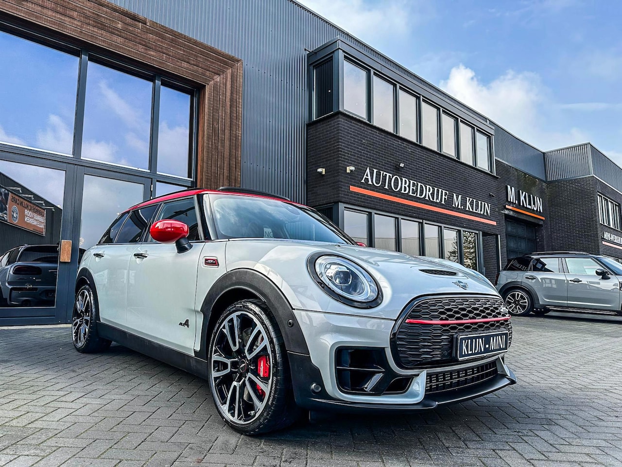MINI Clubman - Mini 2.0 JCW ALL4 F1 aut 306pk/pano/camera/head up/vol/btw - AutoWereld.nl