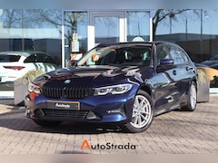 BMW 3-serie Touring - (g21) 320e 204pk I HiFi I Navi I Carplay I Stoelverwarming I LED I Cruise I Tansanitblau