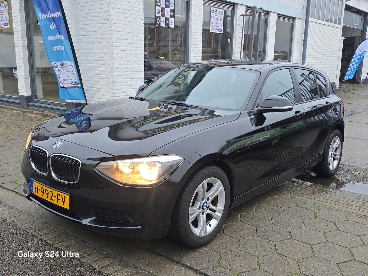 BMW 1-serie - 116i High Executive*rijd perfect*navi*airco*velgen*apk*nette auto*inruil mog!!! - AutoWereld.nl