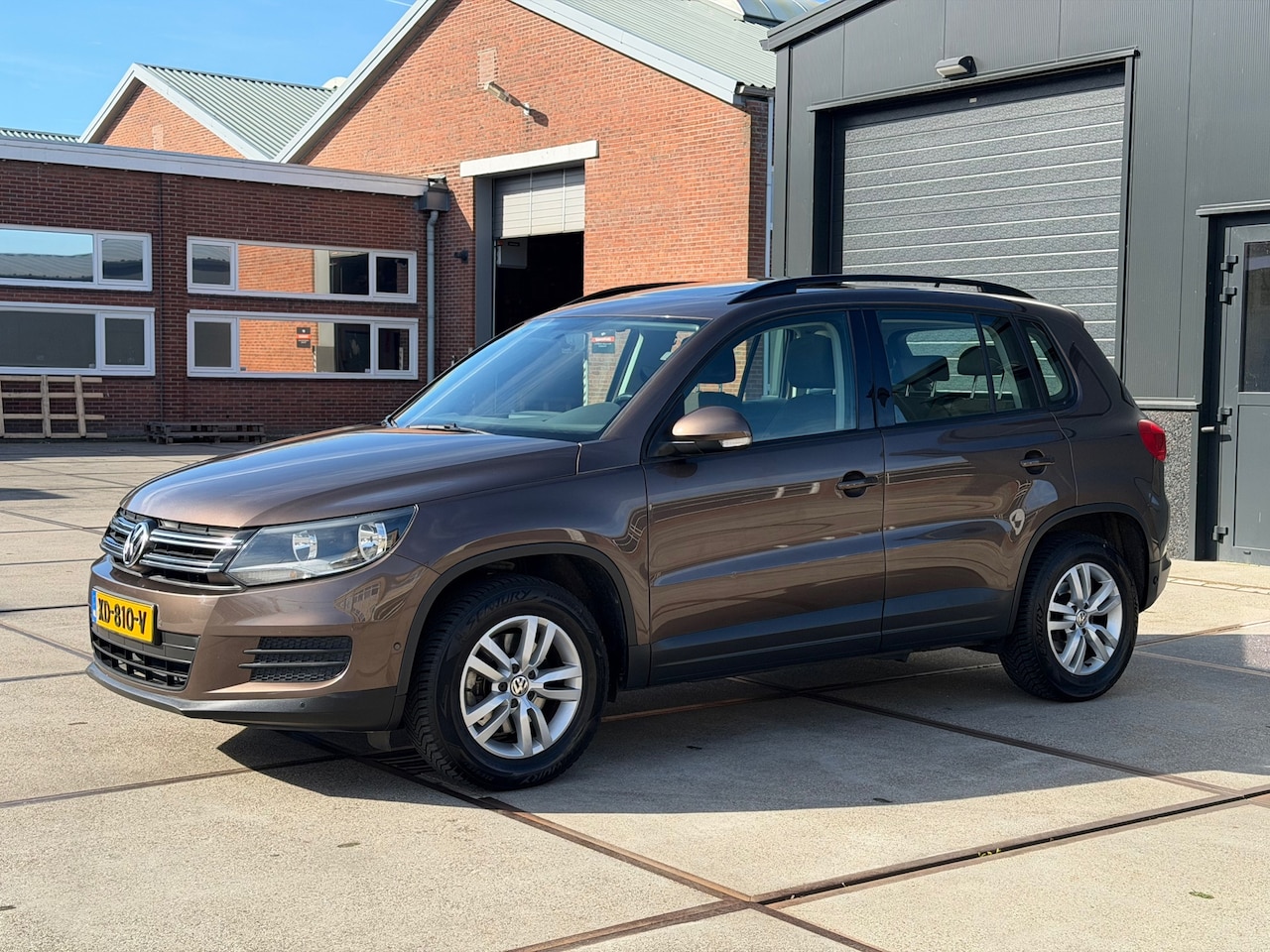 Volkswagen Tiguan - 1.4 TSI Sport&Style Panoramadak Navi Trekhaak - AutoWereld.nl