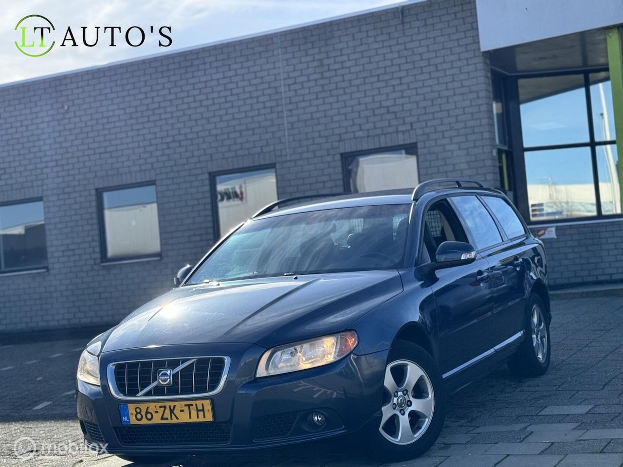 Volvo V70 - 2.0 Momentum|Leder Navi Cruise Clima APK Trekhaak - AutoWereld.nl