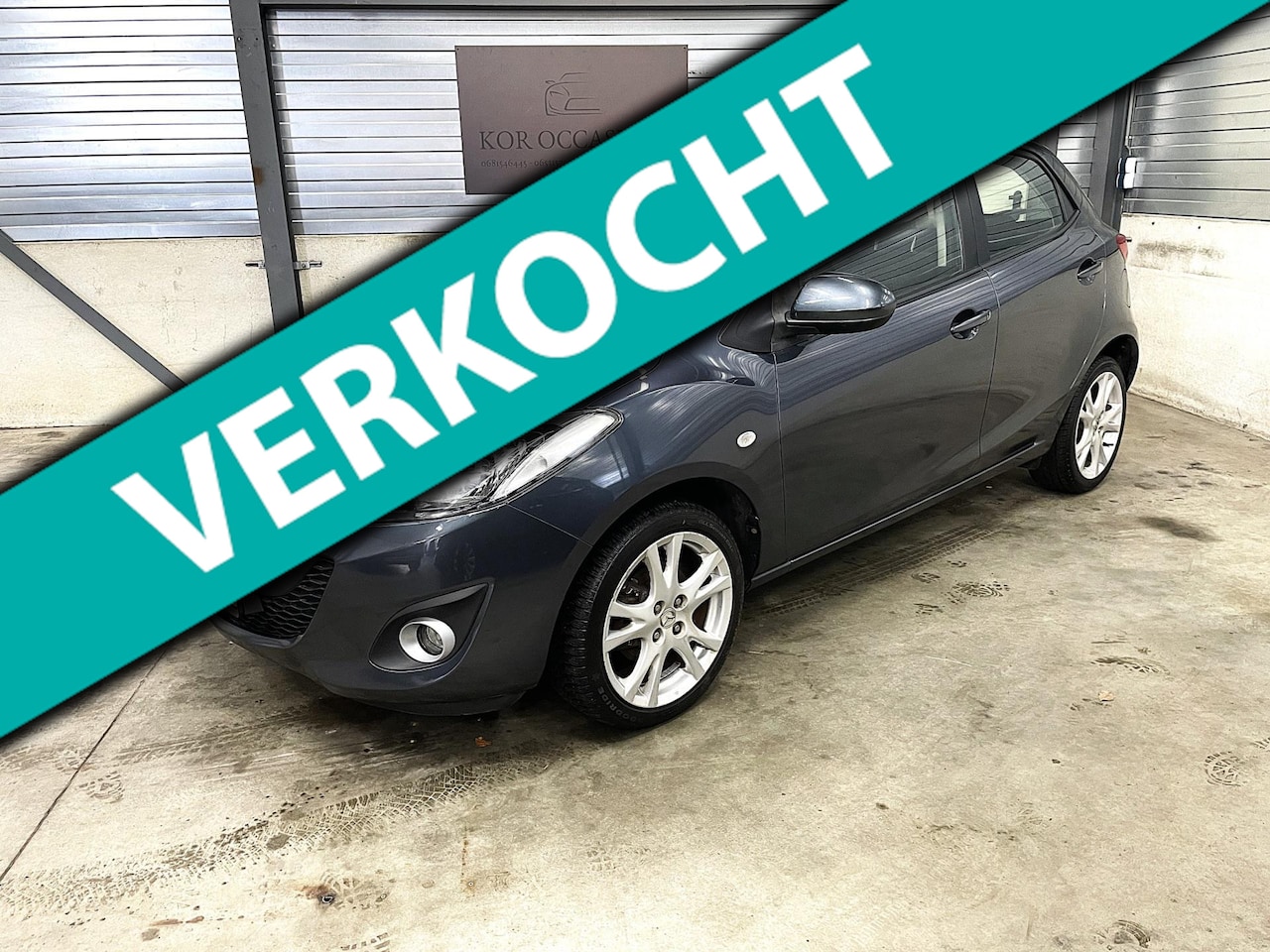 Mazda 2 - 1.3 GT-L 2e eigenaar airco stoelverwarming APK - AutoWereld.nl