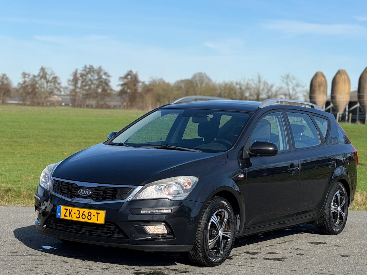 Kia Cee'd Sporty Wagon - 1.4 CVVT X-pect | Nap | Airco - AutoWereld.nl