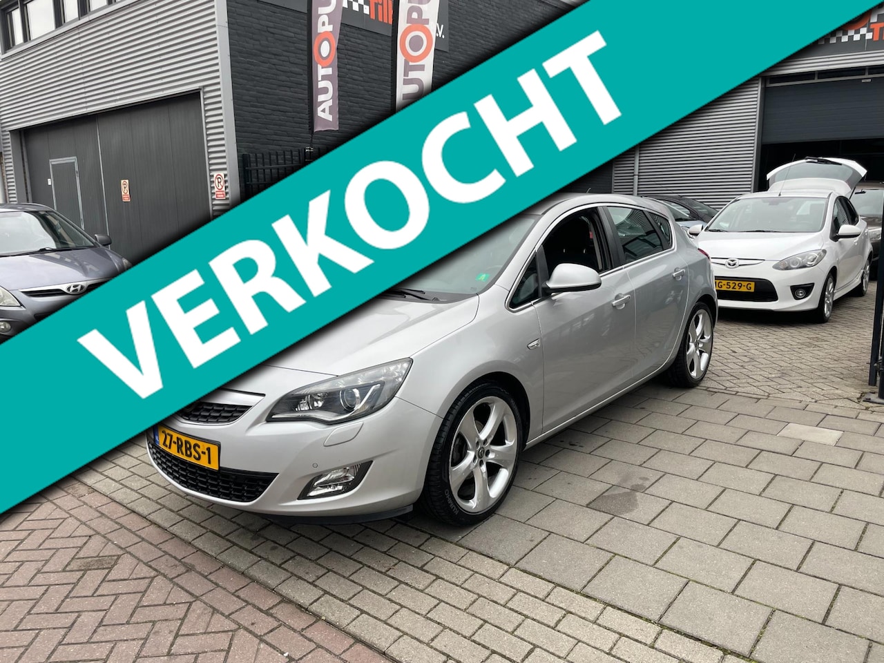 Opel Astra - 1.4 Turbo Sport 3e Eigenaar! Airco Navi PDC NAP APK - AutoWereld.nl