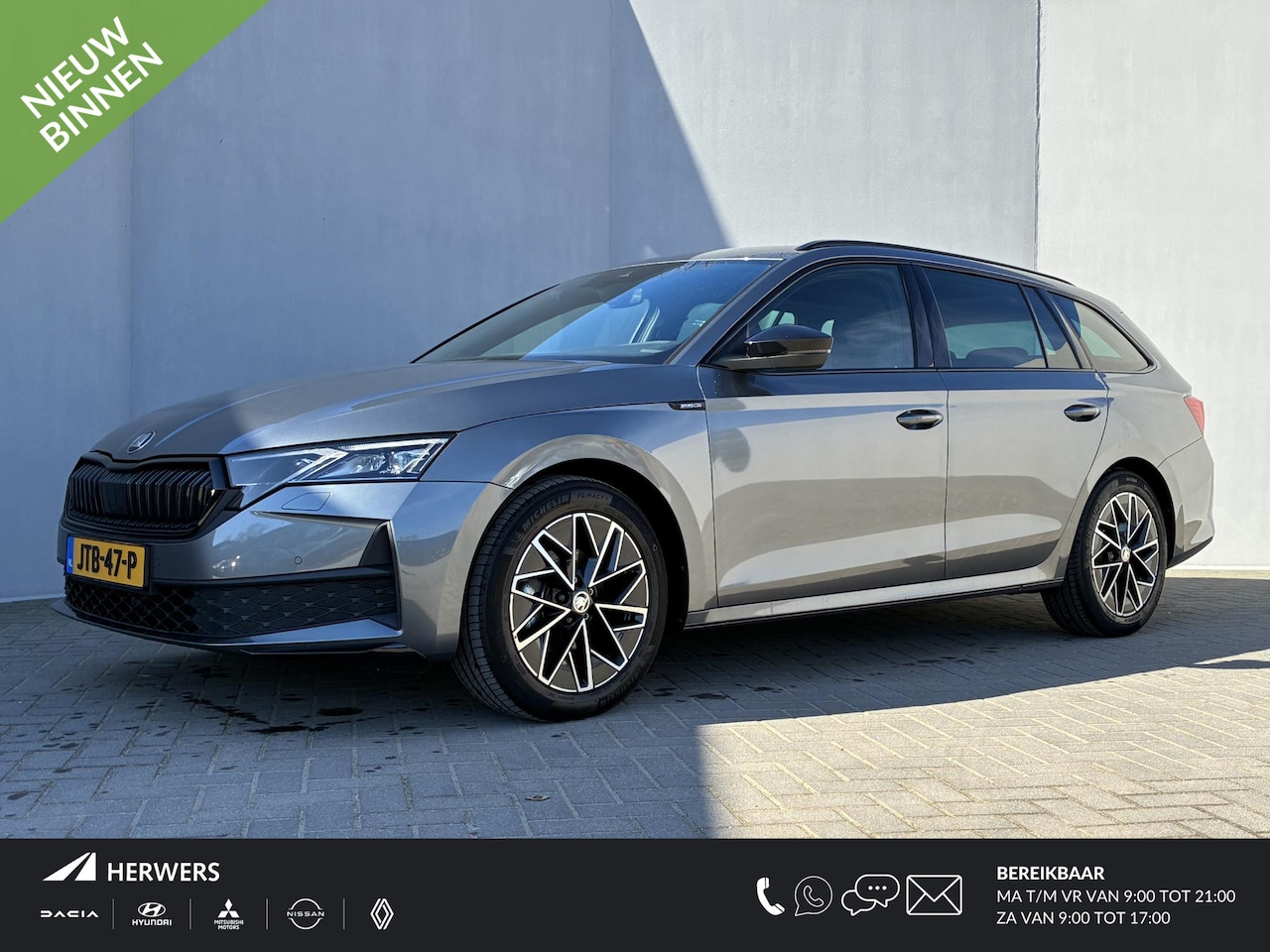 Skoda Octavia Combi - 1.5 TSI MHEV Sportline Business / Fabrieksgarantie t/m 12-2028 / Adaptieve Cruise Control - AutoWereld.nl