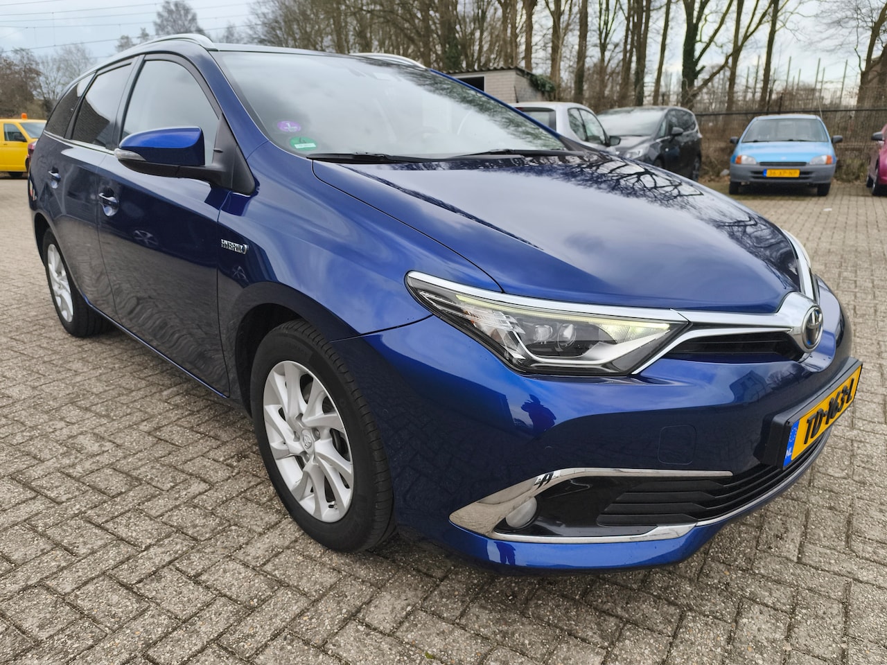 Toyota Auris Touring Sports - 1.8 Hybrid Executive 1.8 Hybrid Executive, Panoramadak, Trekhaak - AutoWereld.nl