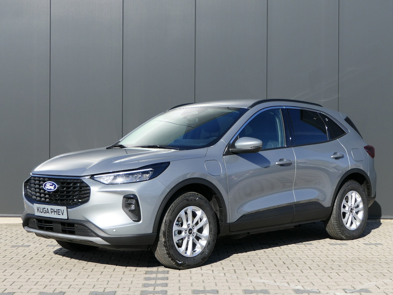 Ford Kuga - 2.5 PHEV Titanium | Cruise control adaptief met Stop&Go en stuurhulp | Draadloze telefoonl - AutoWereld.nl