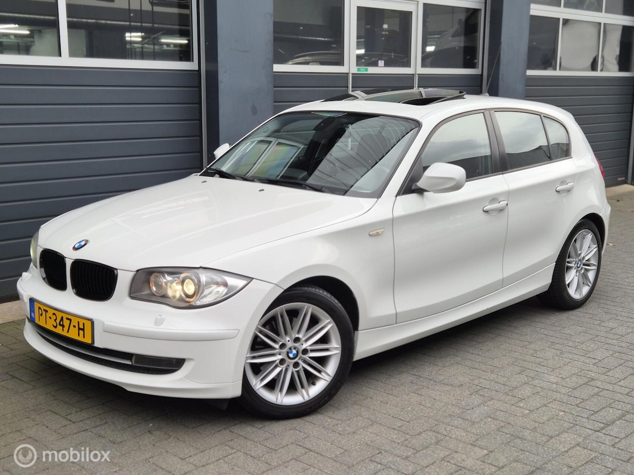 BMW 1-serie - 120i Business Line Ultimate Edition | PANO | STOEL.V | XENON | CLIMA | PDC | - AutoWereld.nl