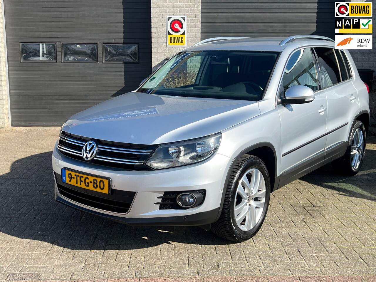 Volkswagen Tiguan - 1.4 TSI Sport&Style *LMVelgen*Clima* - AutoWereld.nl