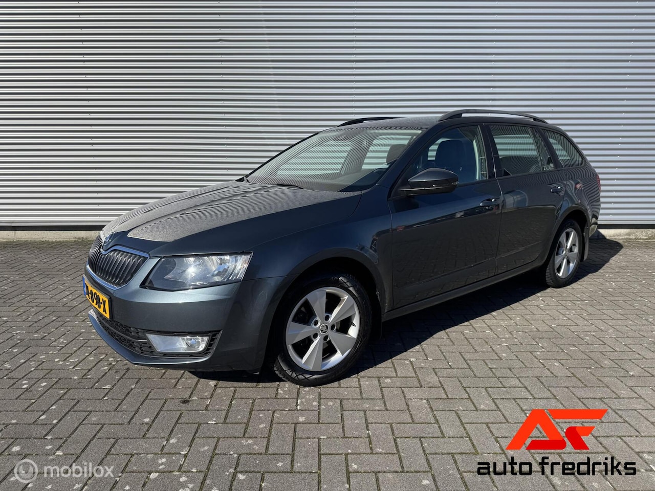 Skoda Octavia Combi - 1.4 TSI Ambition Businessline | Navigatie | Stoelverwarming - AutoWereld.nl