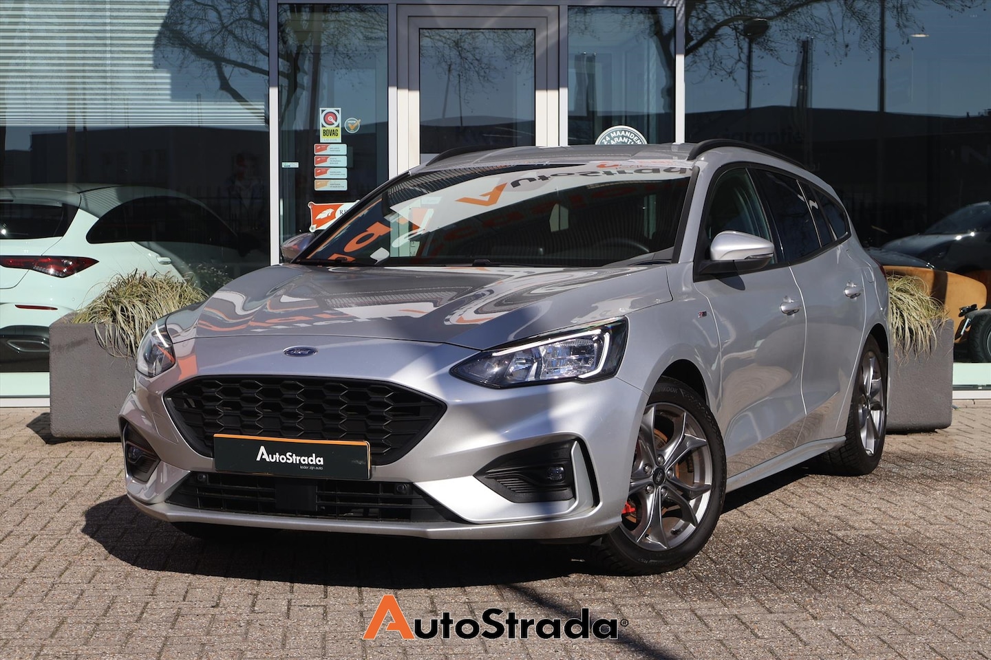Ford Focus Wagon - 1.0 ST-Line 155pk | Cruise | Climate | Trekhaak | Virtual | B&O Audio | Camera | Keyless | - AutoWereld.nl