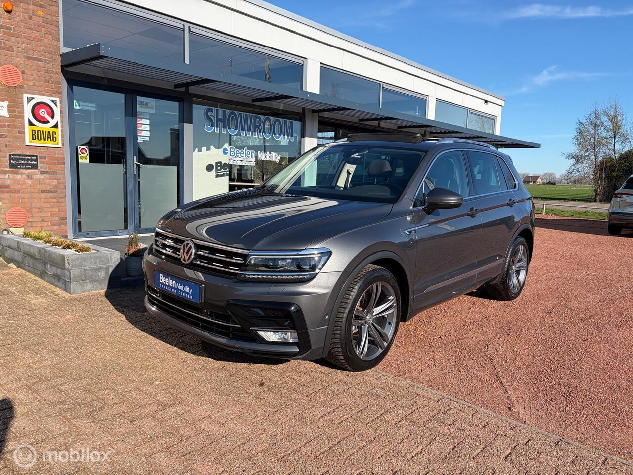 Volkswagen Tiguan - 1.4 TSI ACT Highline | Pano | Camera | LMV - AutoWereld.nl