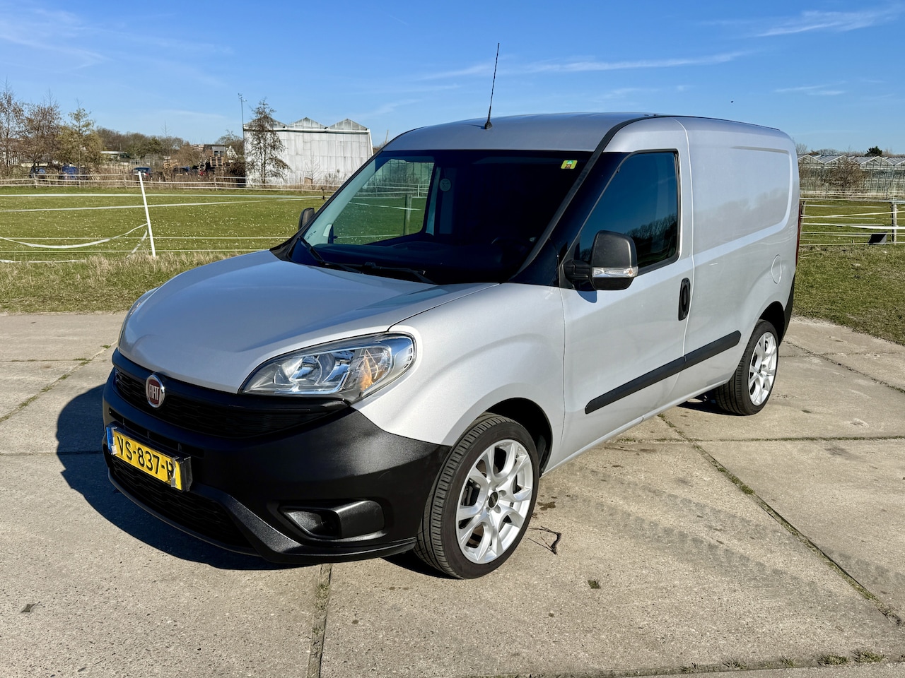 Fiat Doblò Cargo - 1.3 MJ L1 H1 64.354km NAP airco leder - AutoWereld.nl