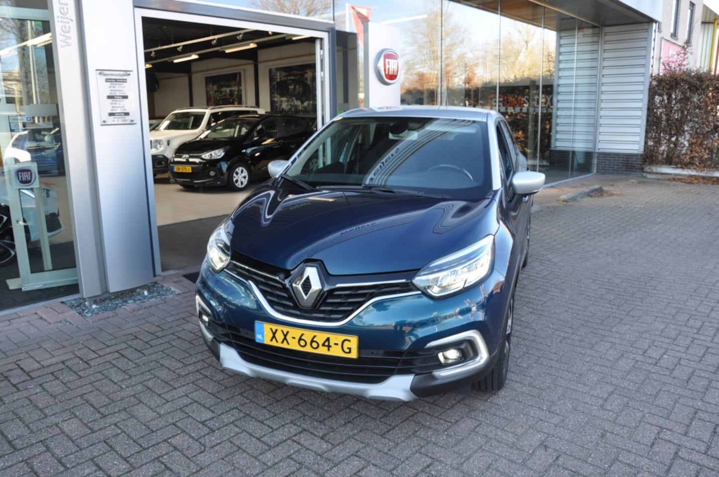 Renault Captur - 0.9 TCe Intens Trekhaak Bi Colore - AutoWereld.nl